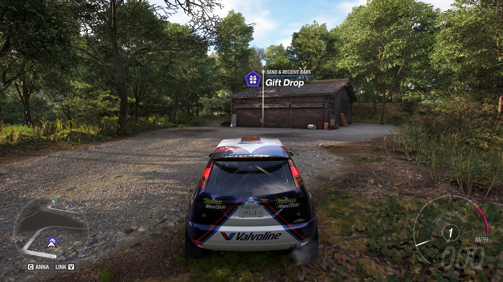 Forza Horizon 6 Barn Finds: A player parked outside an old wooden barn on a wooded hillside.