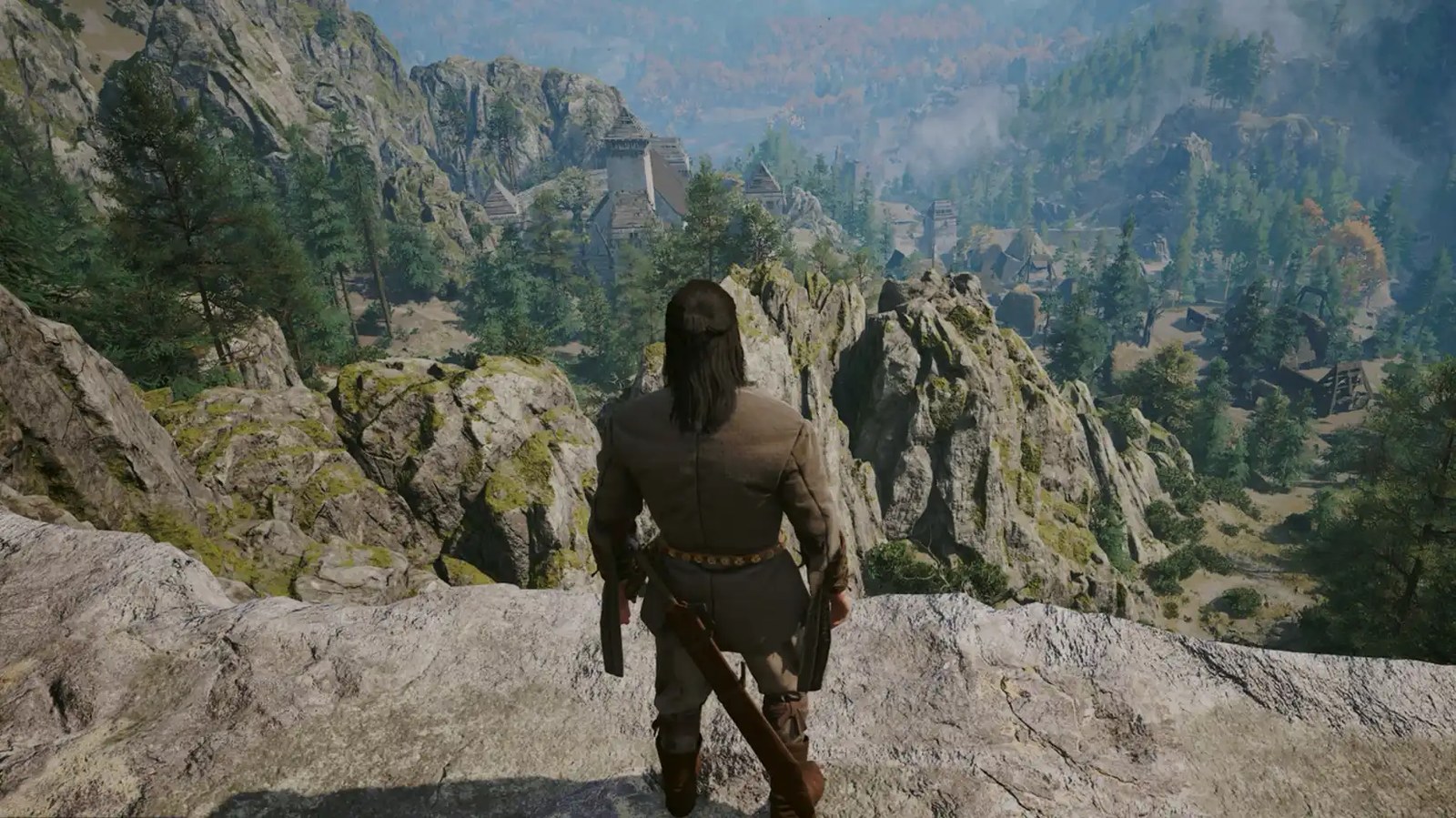 Coen standing on a cliff's edge looking over Laslea Glen in The Blood of Dawnwalker.