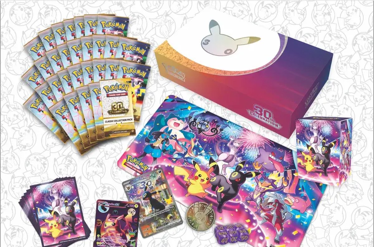 All the items contained in Pokemon's 30th anniversary Ultra Premium Collection that is themed around day and night cycles. 
