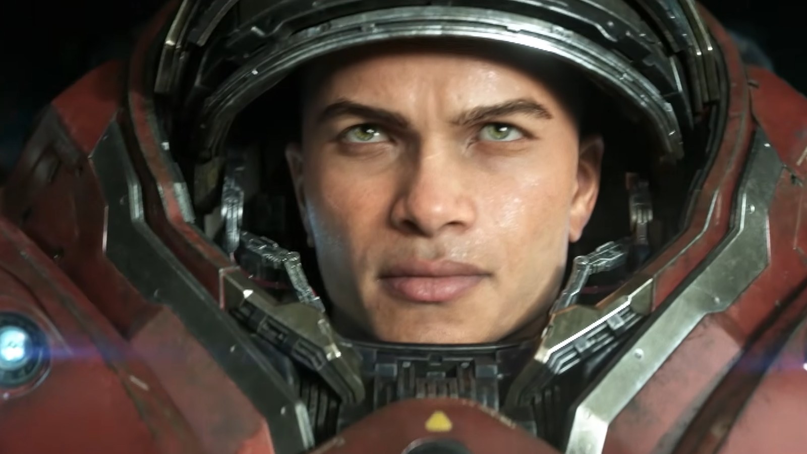 Starcraft space marine with lifted visor looking toward camera