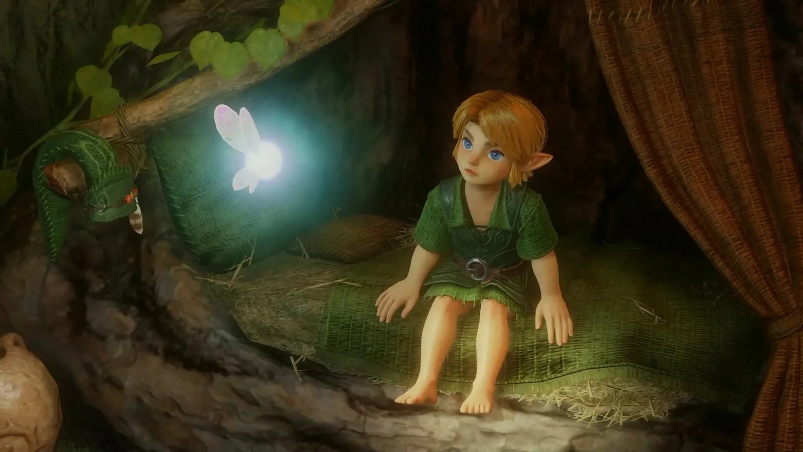 A screenshot from the Legend of Zelda remake gameplay presentation, showing Link on a bed.