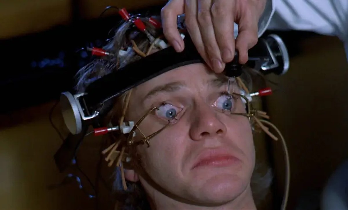 Malcom McDowell has his eyes held open with a scary contraption in A Clockwork Orange