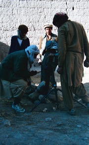 Muj preparing a mortar for firing. - Abdul Qadir