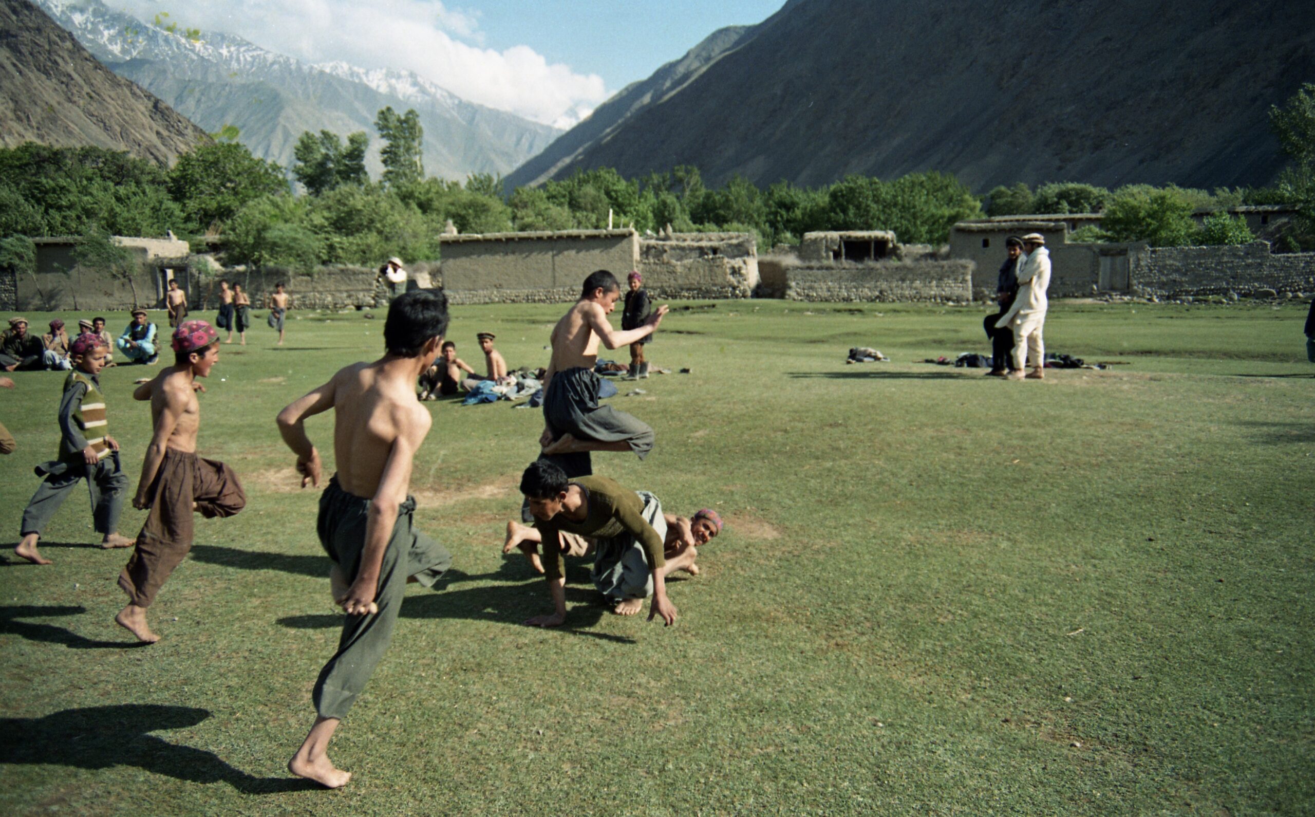 Children playing the game of Khosay ( hopping on o — 1990-06-01T00:00:00Z Dönemi Askeri Tarih Belgesi
